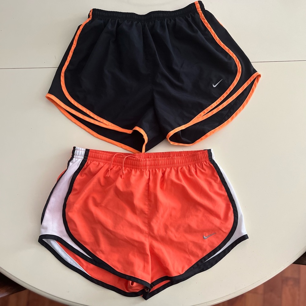 2 Pairs Nike Running shorts.